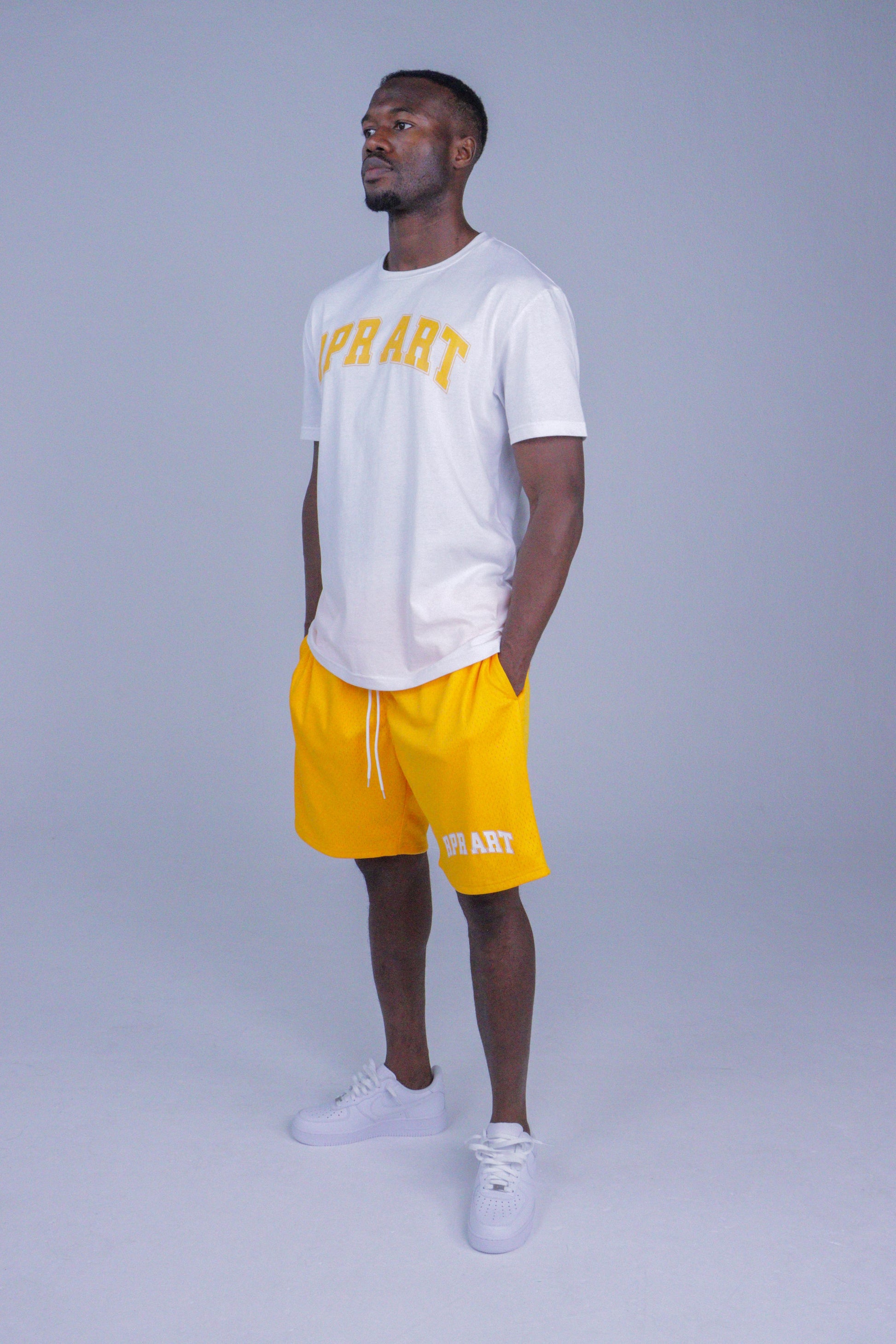 yellow basketball shorts
mesh gym shorts
RPR ART shorts
unisex sportswear
breathable summer shorts
drawstring activewear shorts
mid-thigh shorts
streetwear shorts
cotton mesh shorts
shorts for men and women