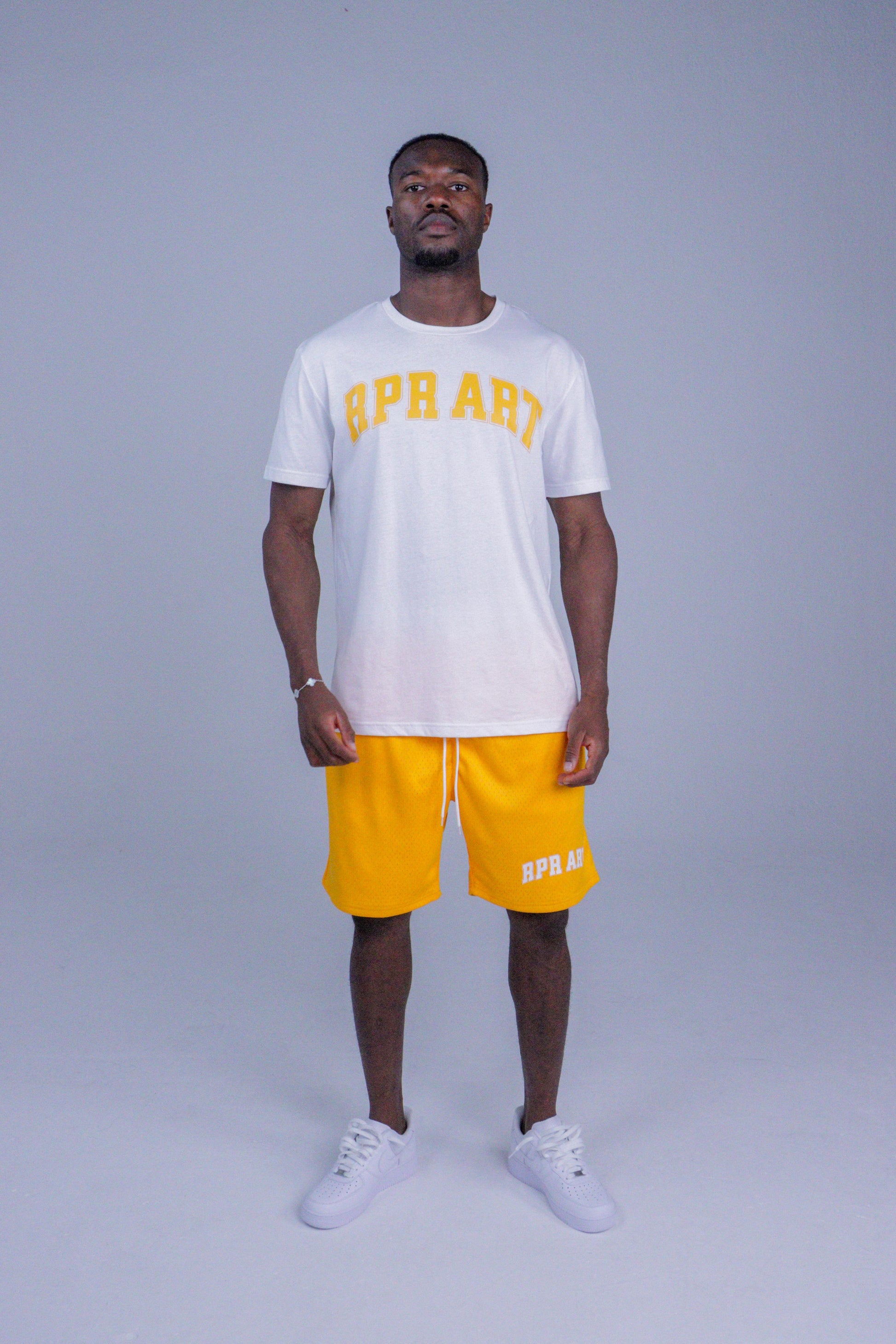 yellow basketball shorts
mesh gym shorts
RPR ART shorts
unisex sportswear
breathable summer shorts
drawstring activewear shorts
mid-thigh shorts
streetwear shorts
cotton mesh shorts
shorts for men and women