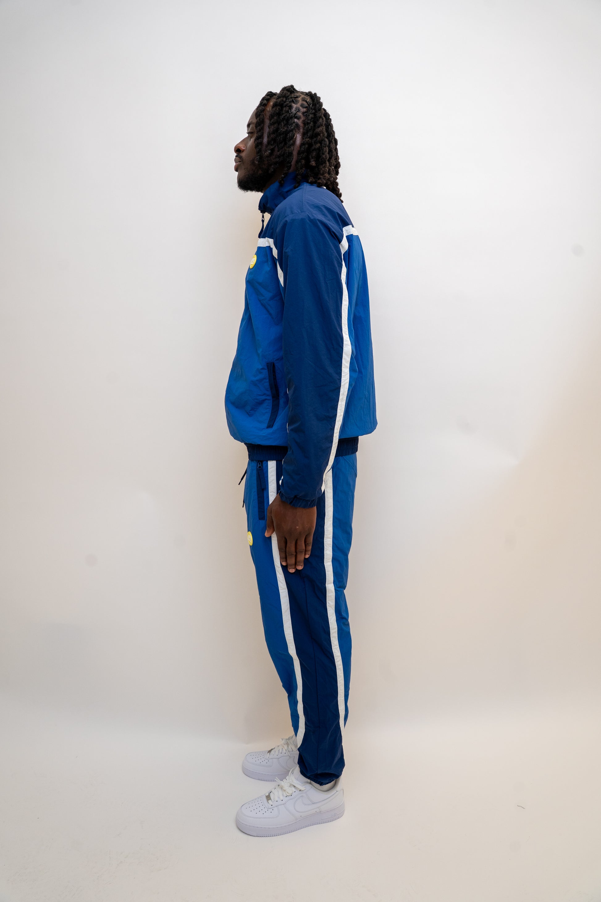 ocean blue tracksuit

navy nylon tracksuit

men’s full tracksuit set

unisex drawstring tracksuit

mesh lined activewear

zip-up track jacket and pants

relaxed fit tracksuit

DopeBoy tracksuit

streetwear active set

lightweight sports tracksuit