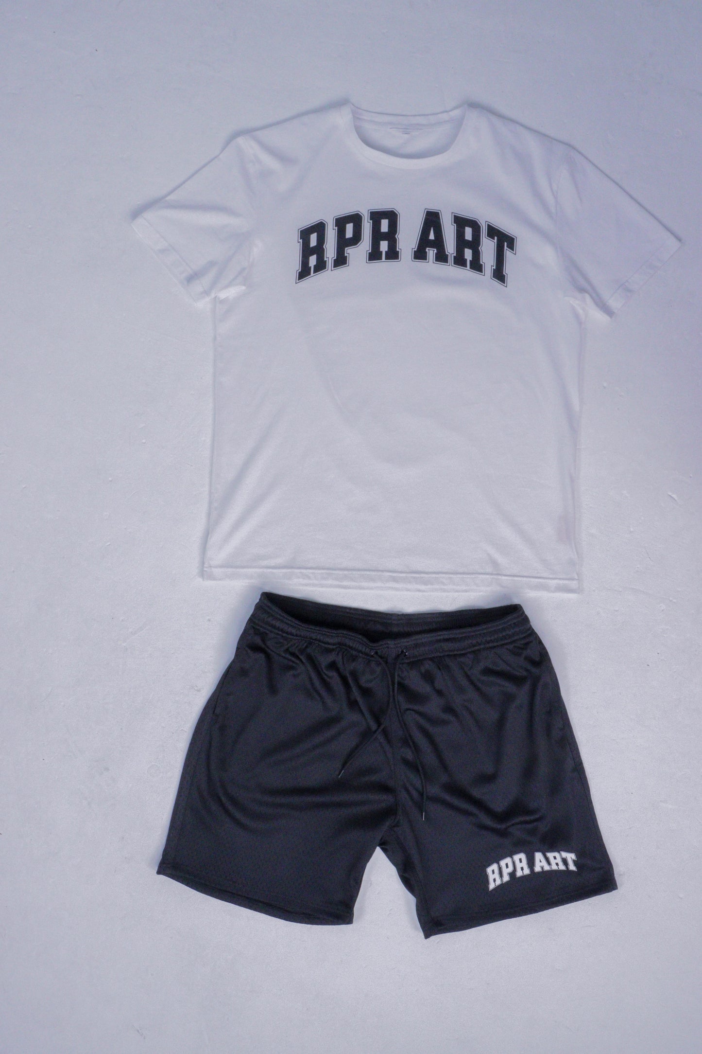 Black mesh basketball shorts with white logo print, mid-thigh length, drawstring waist – unisex athletic wear.

black mesh shorts

basketball shorts for men

unisex active shorts

gym shorts with logo

breathable mesh shorts

summer workout shorts

drawstring waist shorts

HPR ART shorts

training shorts

mid-thigh athletic shorts