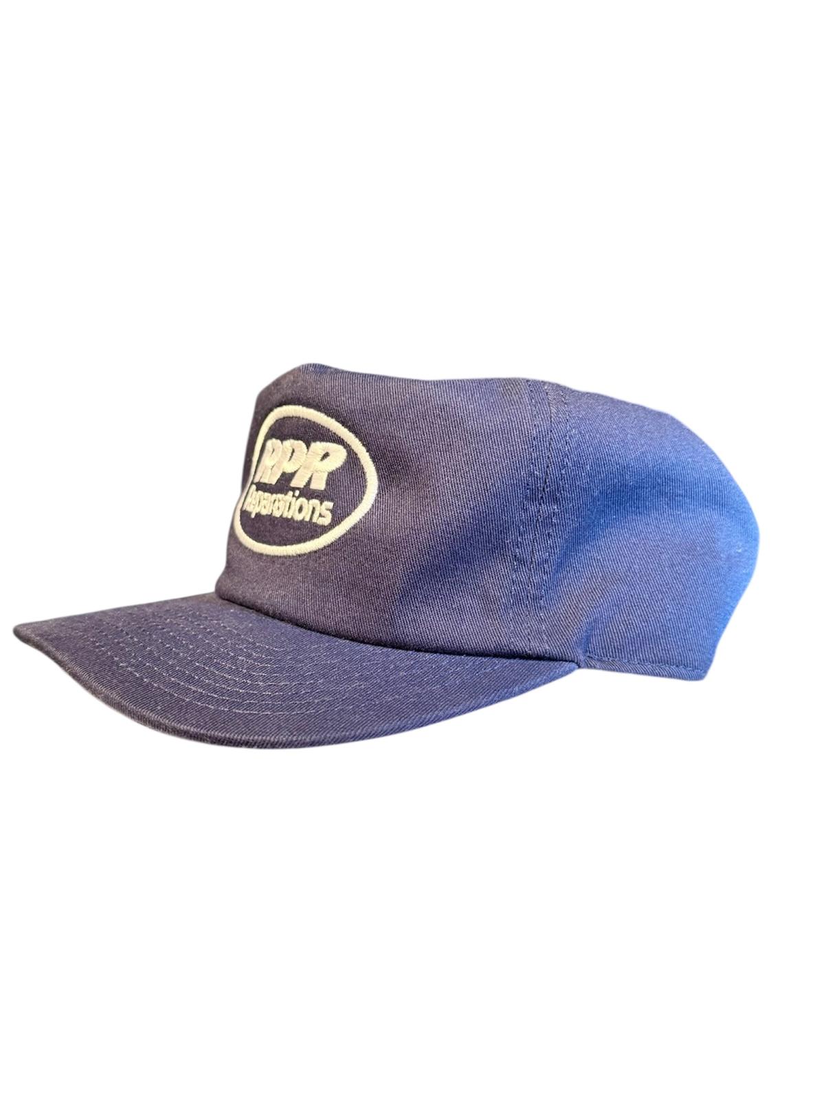 Blue cap with a logo on a white background